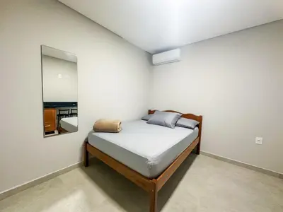 Uma cama ou camas num quarto em Praia de Palmas, Estúdio Aconchegante 700m do Mar - 0187