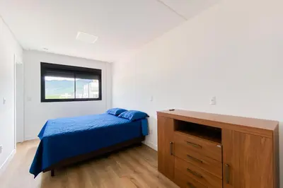 Uma cama ou camas num quarto em Apartamento Frente Mar! 0344