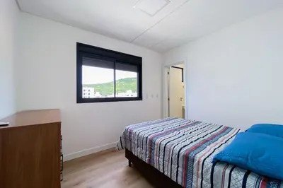 Uma cama ou camas num quarto em Apartamento Frente Mar! 0344