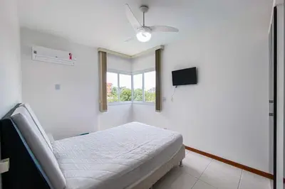 Uma cama ou camas num quarto em Residencial Amanda 0345