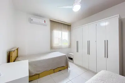 Uma cama ou camas num quarto em Residencial Amanda 0345