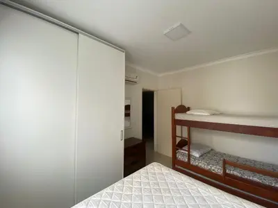 Uma cama ou camas num quarto em Praia de Palmas - 400 metros da praia - Amplo e Aconchegante - 0461