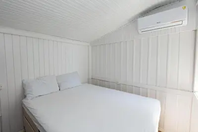 Uma cama ou camas num quarto em Mar em Casa