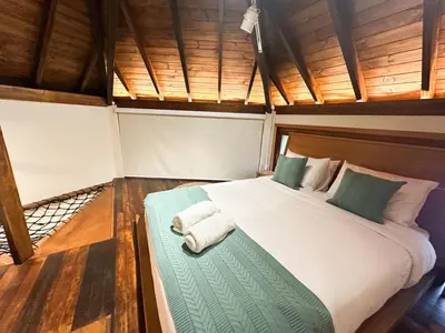Uma cama ou camas num quarto em Refúgio perto do mar em Mariscal - Baoba Suites