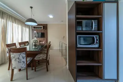 A cozinha ou kitchenette de Curaçao 201 - Cobertura duplex com jacuzzi privativa - 50 metros da Praia de Canto Grande!