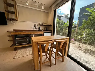 A cozinha ou kitchenette de Refúgio Aconchegante em Mariscal - Baoba Suítes