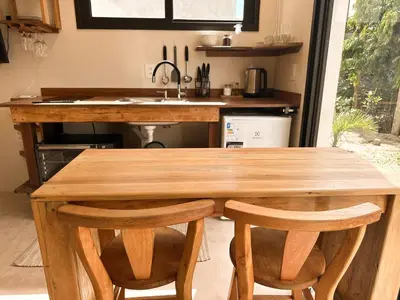 A cozinha ou kitchenette de Refúgio Aconchegante em Mariscal - Baoba Suítes