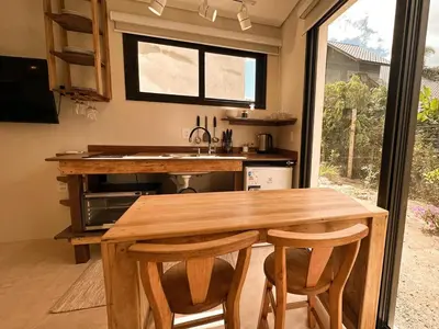 A cozinha ou kitchenette de Refúgio Aconchegante em Mariscal - Baoba Suítes