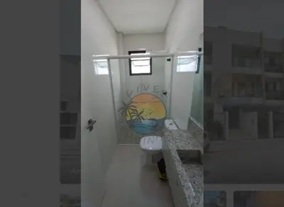 Uma casa de banho em Apartamento próximo a praia e comércio em geral com 03 Dormitórios