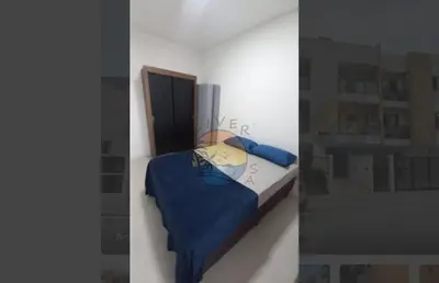 Uma cama ou camas num quarto em Apartamento próximo a praia e comércio em geral com 03 Dormitórios