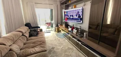 Uma televisão e/ou sistema de entretenimento em Apartamento Zona Central da Praia com 03 Suítes