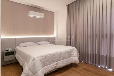 Uma cama ou camas num quarto em 407 Suíte em Localização Incrível Praia de Bombinhas a 120m