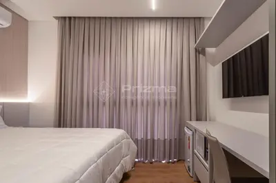 Uma cama ou camas num quarto em 405 Suíte em Localização Incrível Praia de Bombinhas a 120m