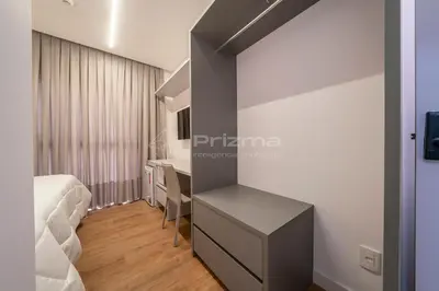 Uma televisão e/ou sistema de entretenimento em 405 Suíte em Localização Incrível Praia de Bombinhas a 120m