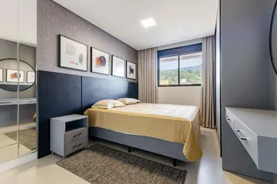 Uma cama ou camas num quarto em Lindíssimo Apto em Condominio com Piscina - Bombas