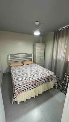 Uma cama ou camas num quarto em Meia praia - Itapema! Fique pertinho da praia