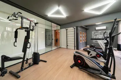 O centro de fitness e/ou as comodidades de fitness de 401 Bl 02 - WaldGarten Bombinhas - 50 m do Mar - Condomínio de Alto Padrão - Piscina - Academia - Salão de jogos