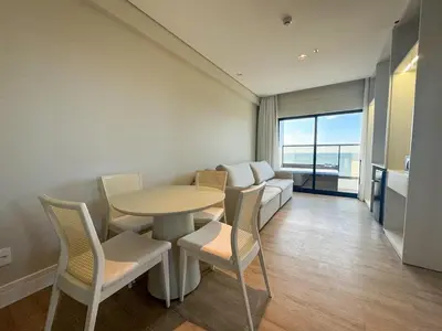 Uma área de estar em Suíte Familia com Hidro Frente Mar Blue Sea