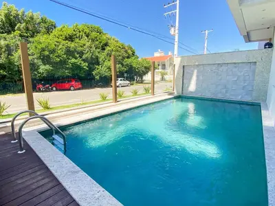 A piscina em ou perto de Apartamento para relaxar 450m da Praia de Palmas - 0113