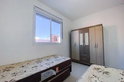 Uma cama ou camas num quarto em Praia de Palmas - Apto 200m do Mar, 3 Dorms - 0167