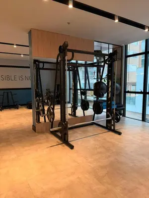 O centro de fitness e/ou as comodidades de fitness de Seu Refúgio de Luxo a Passos do Mar em Itapema