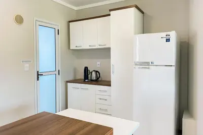 A cozinha ou kitchenette de Na Principal Avenida - 200m da Praia de Palmas - 0196