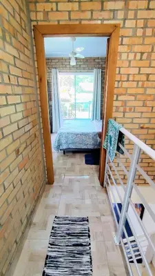 Uma cama ou camas num quarto em Cod 140 - Residencial Torres, Praia de Bombas ap 5
