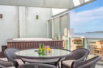 Uma varanda ou terraço em Cobertura Duplex a 100m da Praia com Jacuzzi Privativa