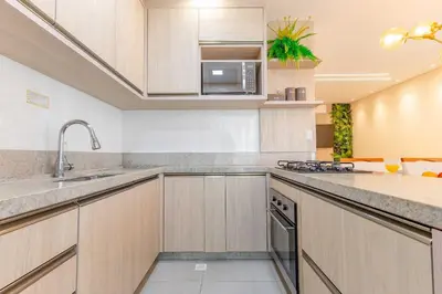 A cozinha ou kitchenette de Ampla Cobertura Duplex com Jacuzzi Privativa