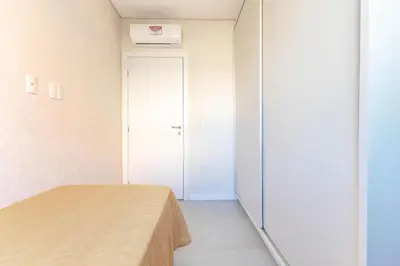 Uma cama ou camas num quarto em Ampla Cobertura Duplex com Jacuzzi Privativa