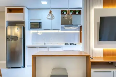 A cozinha ou kitchenette de Sunrise Residence - Apto 2 dormitórios Praia de Bombinhas - Centro