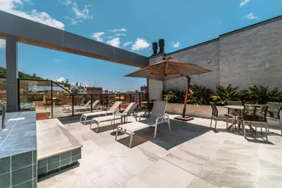 Um pátio ou outra área exterior em Sunrise Residence - Apto 2 dormitórios Praia de Bombinhas - Centro