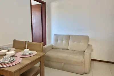 Uma área de estar em Perfeito! Apto 1 quarto na Praia de Palmas - WG04I