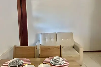 Uma área de estar em Perfeito! Apto 1 quarto na Praia de Palmas - WG04I