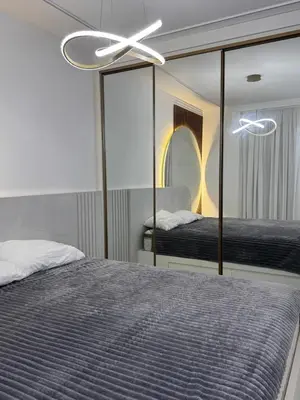 Uma cama ou camas num quarto em Gran Safira Residential Apartment