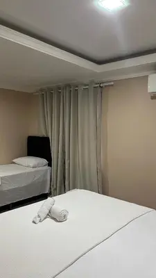 Uma cama ou camas num quarto em Pousada da Luz 20v