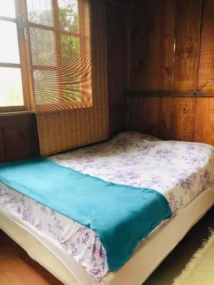Uma cama ou camas num quarto em Between the sea and the mountains