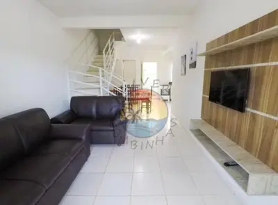 Uma televisão e/ou sistema de entretenimento em Ampla Casa Zona Central da Praia de Mariscal com 03 Dormitórios
