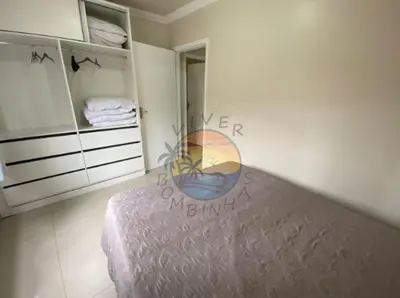 Uma cama ou camas num quarto em Apartamento no Centro de Bombinhas Próximo a Praia e Comércio em Geral