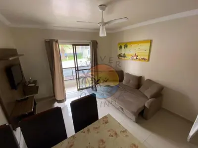 Uma área de estar em Apartamento no Centro de Bombinhas Próximo a Praia e Comércio em Geral