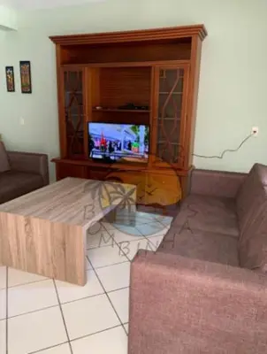 Uma área de estar em Sobrado Alto Padrão Zona Central da Praia com 02 Dormitórios