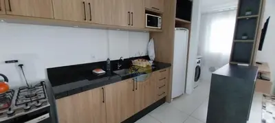 A cozinha ou kitchenette de Cobertura Alto Padrão no Centro de Bombinhas com 03 Suítes