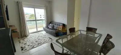 Uma cama ou camas num quarto em Cobertura Alto Padrão no Centro de Bombinhas com 03 Suítes