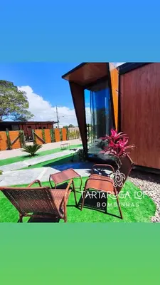 Um jardim no exterior de Refúgio exclusivo para casais