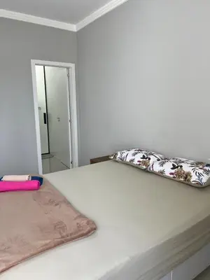 Uma cama ou camas num quarto em Casa em Tijucas da tati