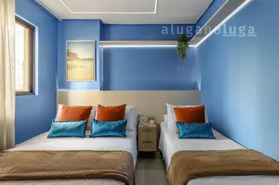Uma cama ou camas num quarto em Aconchego e Lazer no Coração de Itapema