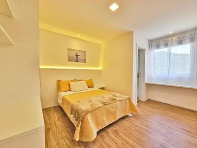 Uma cama ou camas num quarto em Novo, Sofisticado, com Vista mar