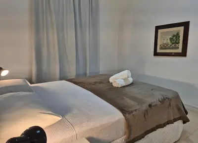 Uma cama ou camas num quarto em Vista Incrível Frente Mar 2 Quartos |CURTA134
