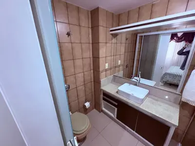 Uma casa de banho em Apartamento Quadra Mar