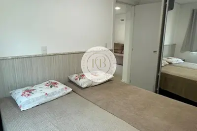 Uma cama ou camas num quarto em Residencial Quebec